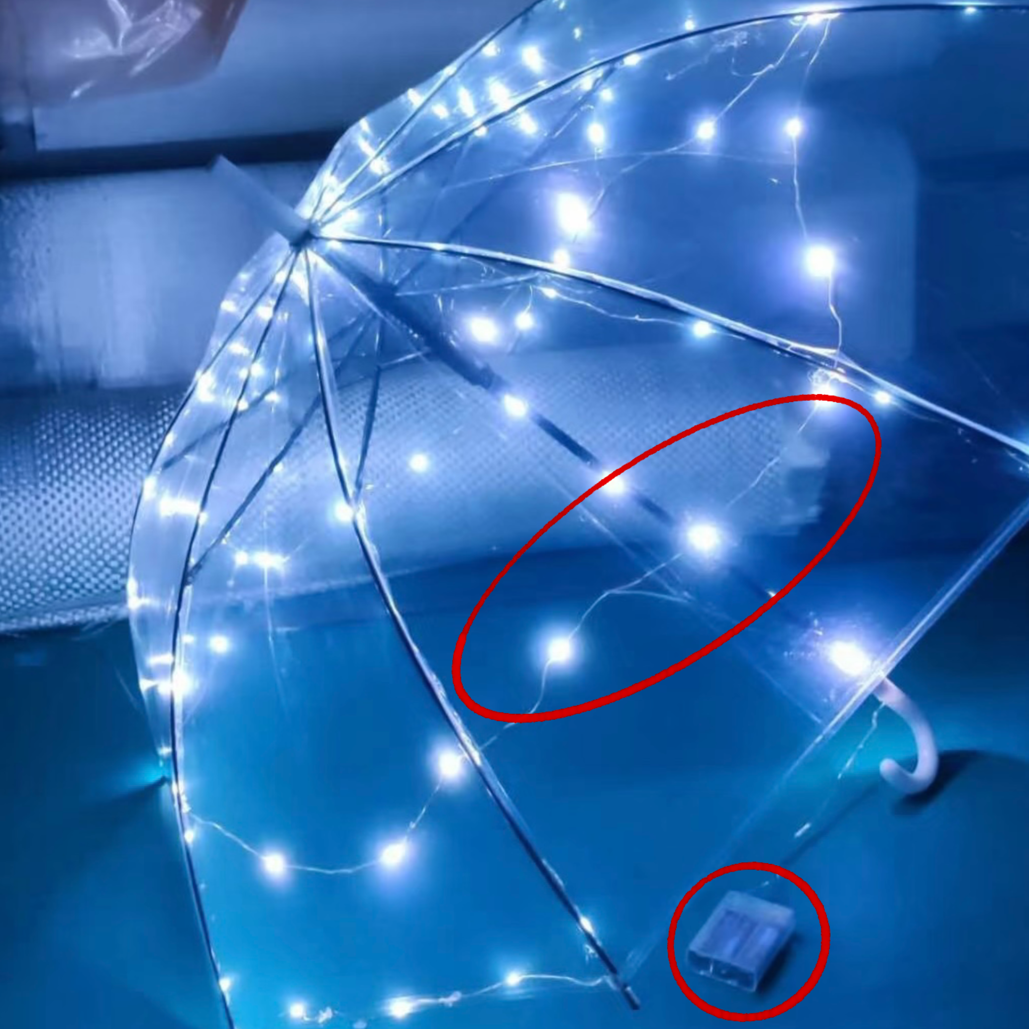 This photo  is the finished glowing umbrella. The LED lights are attached to the ribs, and the glow looks great. I wrapped the lights around the frame, secured them with hot glue, and placed the battery pack near the handle for easy access. After testing, the lights were evenly distributed and brightly.