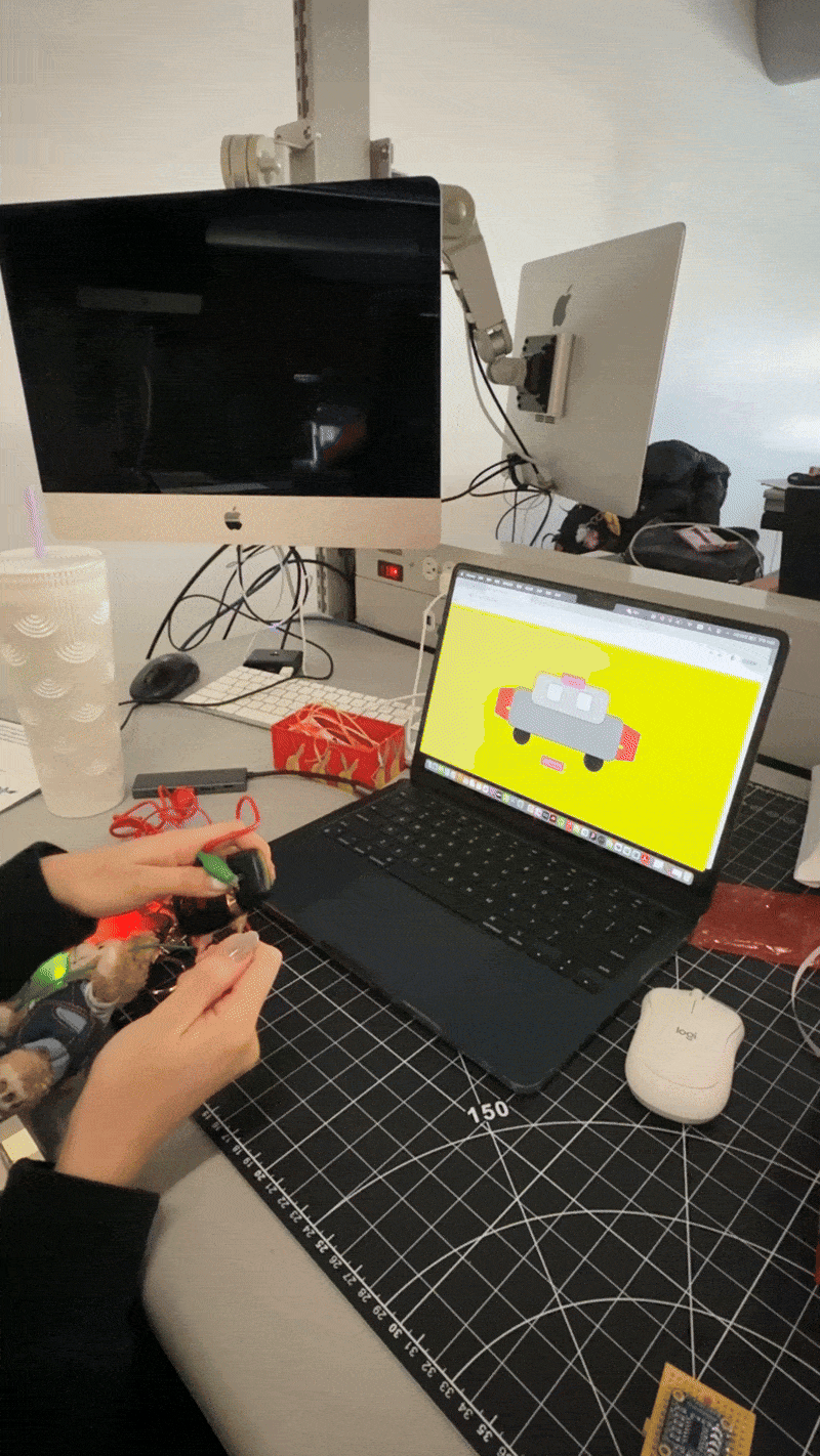 With copper tape arranged on a printout, I created a custom input pad that controls animations on the screen through the Makey Makey system.